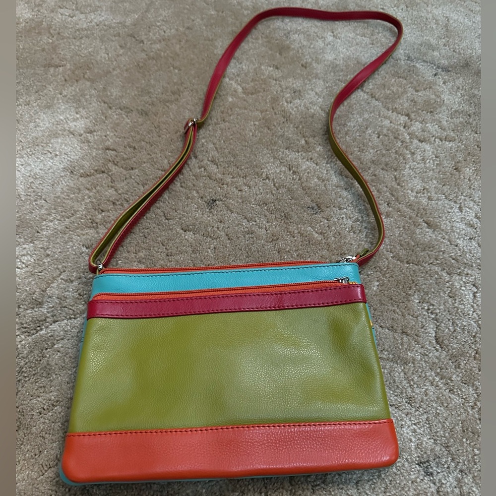 100% leather crossbody bag.